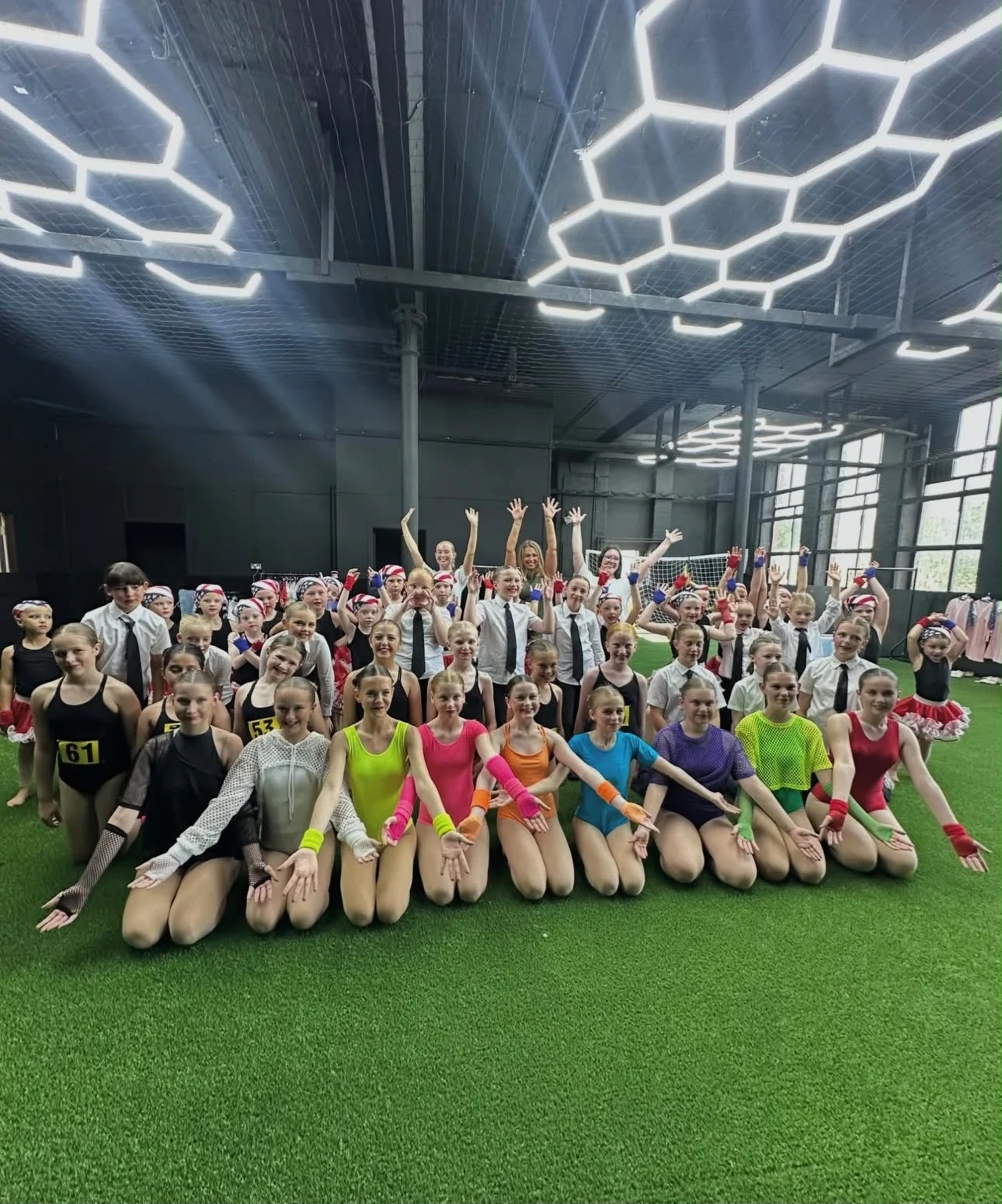Just Dance Academy dancers gathered together in the UK Sports Arena