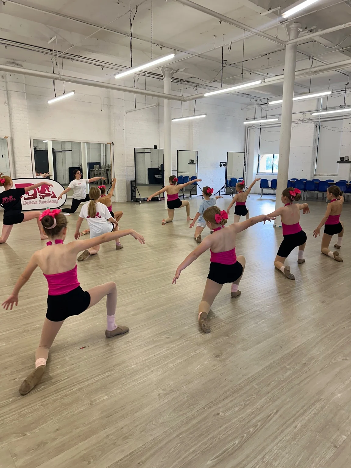 Just Dance Academy dancers practising a floor-based routine in the Welkin Mill studio