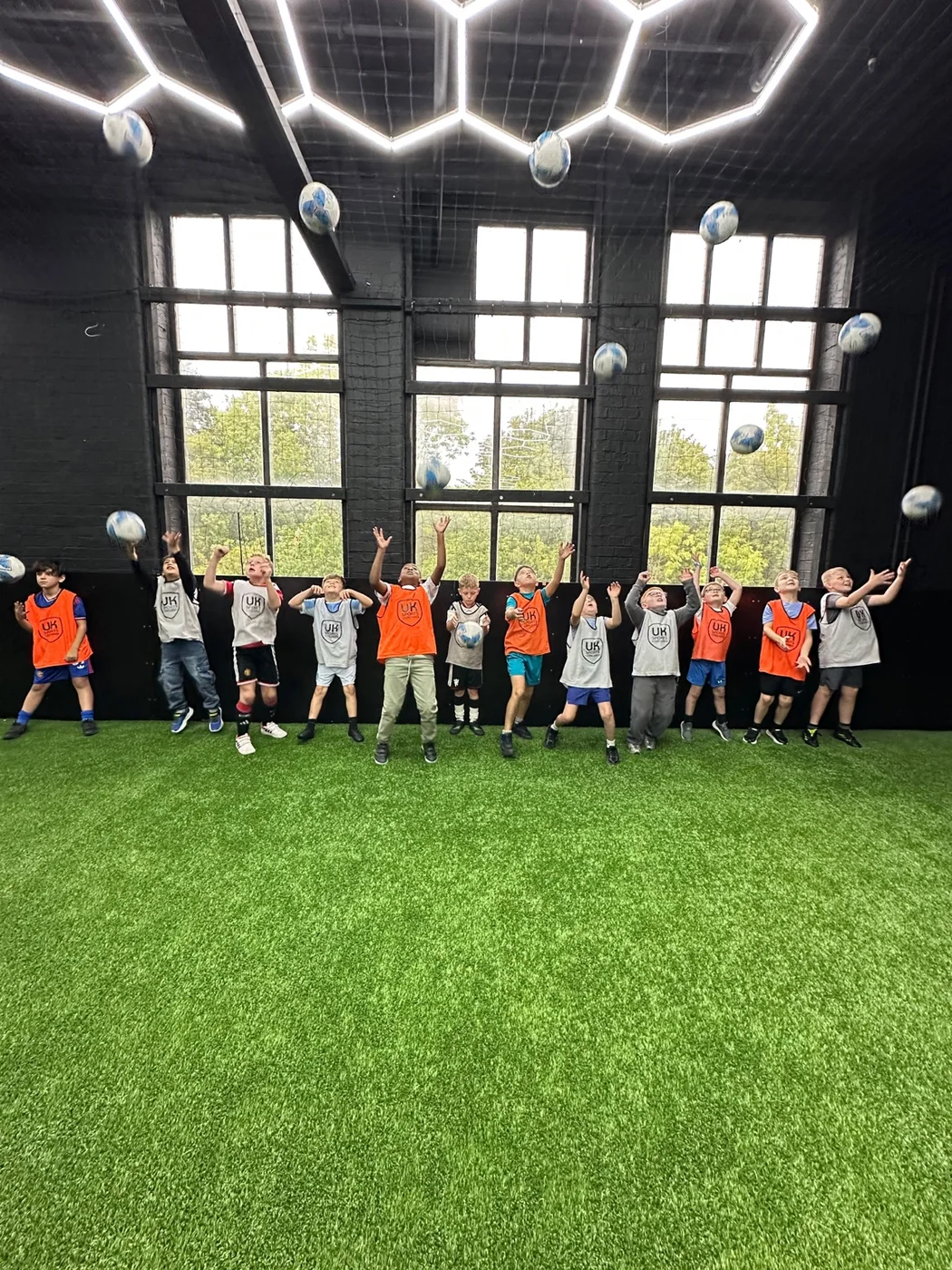 Children enjoying a UK Sports Coaching Ltd birthday party in the UK Sports Arena